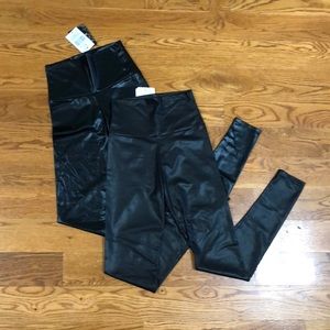2 Black faux leather leggings. Size Small.